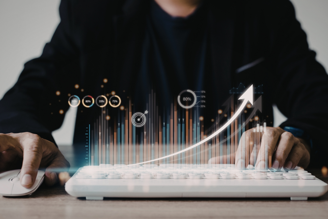 A professional marketer reviewing performance metrics on a laptop, symbolizing A/B testing and optimization of calls to action. This image reinforces the importance of tracking CTA performance to refine copy, placement, and design.