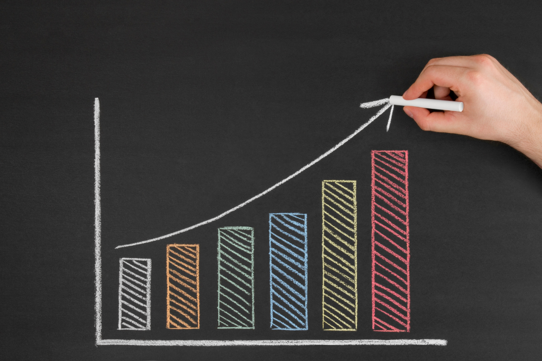 A digital growth graph representing increased website traffic after content refresh.