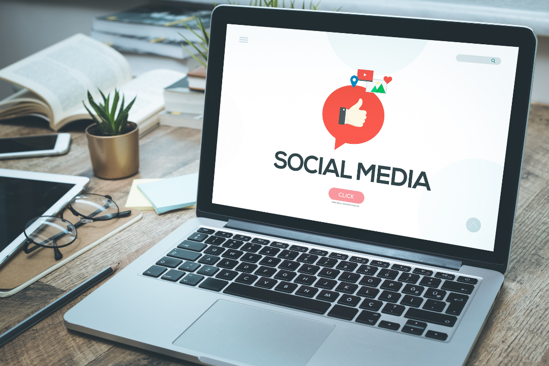 A person scheduling social media posts on a digital planner with icons for Instagram, TikTok, and YouTube.