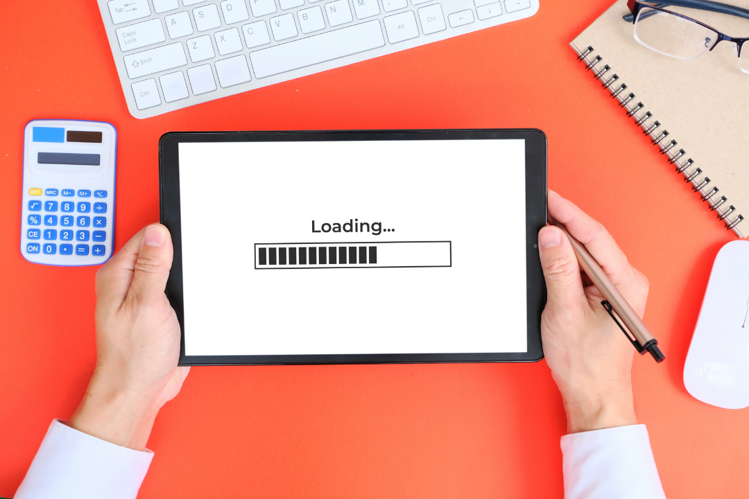 Laptop displaying website speed test results using a performance analysis tool, surrounded by web optimization icons